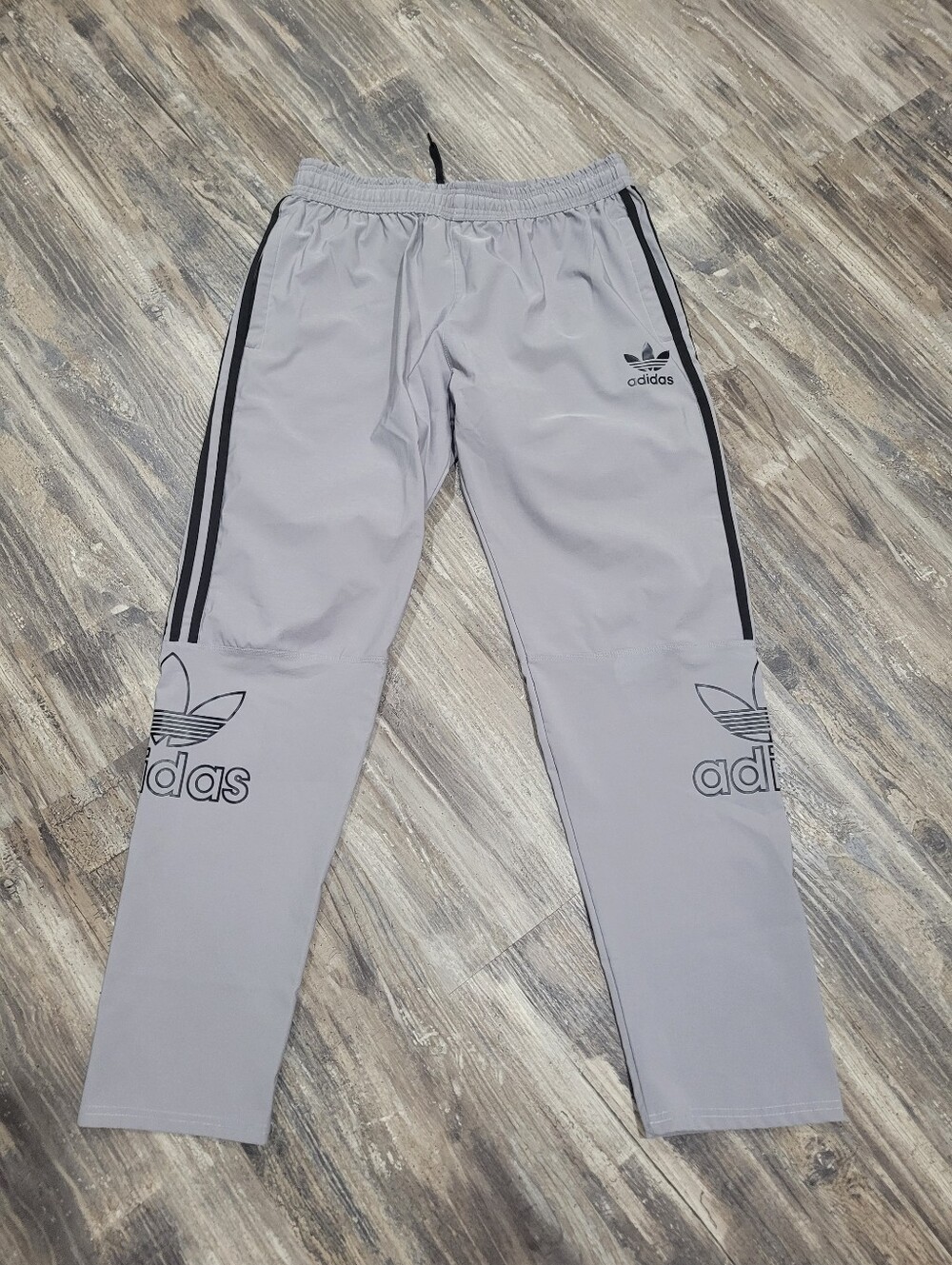 Adidas large logo track Athletic pants. Gray XXL. Fits Like XL. Never Worn
